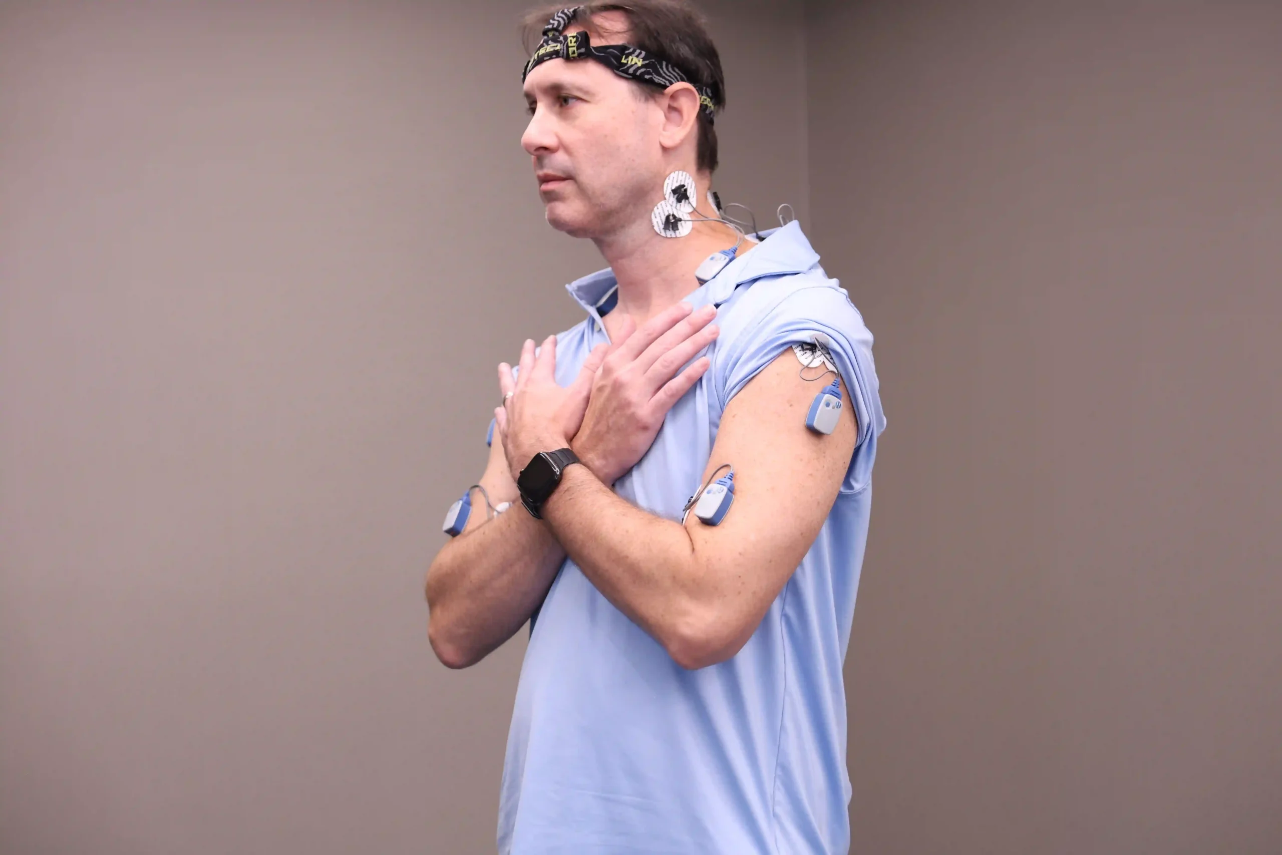 A worker completing a functional assessment with wireless sensors